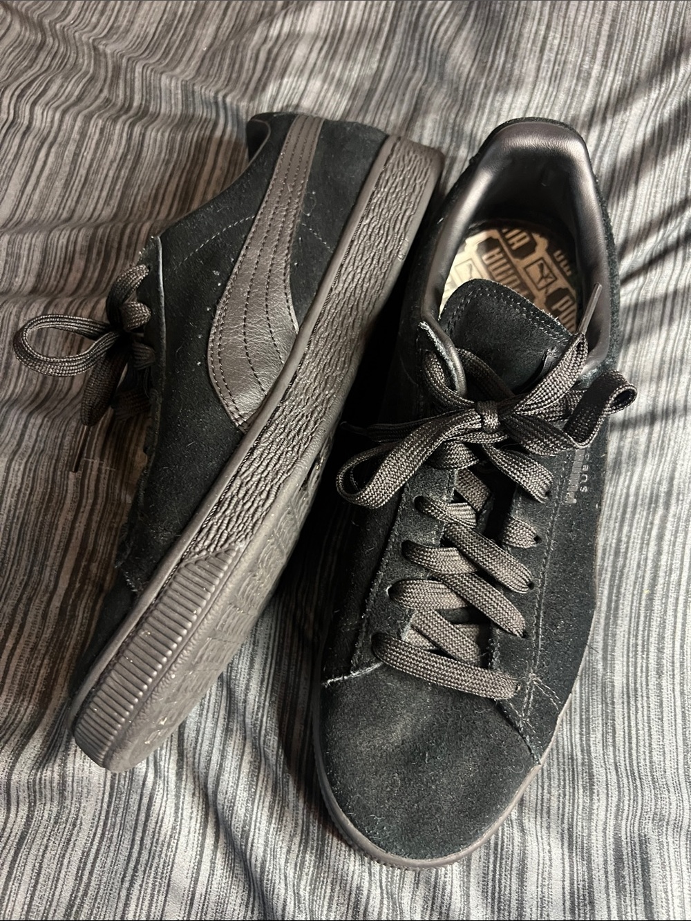 Puma Suede Classic sneakers.